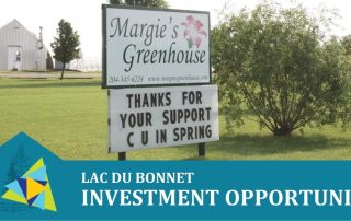 Margie's Greenhouse storefront sign located on property.